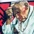 Mural papieski na Ostrowie Tumskim oblany czerwoną farbą w rocznicę śmierci Jana Pawła...