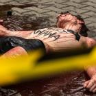 Krwawy topless  Autor: Extinction Rebellion Wrocław