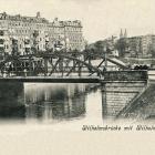 Most Mieszczański - ten starszy, z roku 1876, ma ażurową konstrukcję kratownicową z...